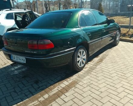 Зеленый Опель Омега, объемом двигателя 2 л и пробегом 393 тыс. км за 2500 $, фото 1 на Automoto.ua