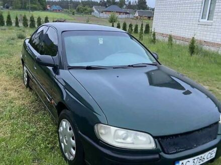 Зеленый Опель Омега, объемом двигателя 2 л и пробегом 339 тыс. км за 1250 $, фото 1 на Automoto.ua