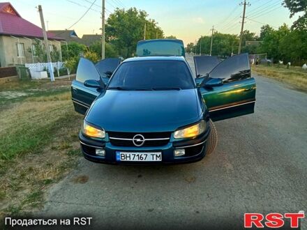 Зеленый Опель Омега, объемом двигателя 2 л и пробегом 230 тыс. км за 2300 $, фото 1 на Automoto.ua