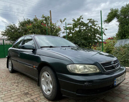 Зеленый Опель Омега, объемом двигателя 2 л и пробегом 482 тыс. км за 2500 $, фото 1 на Automoto.ua