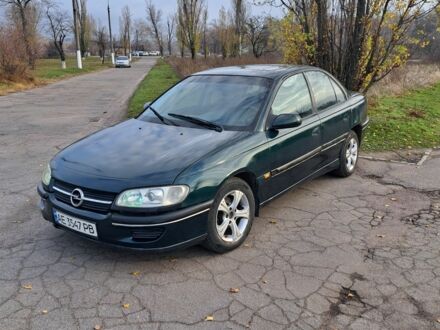 Зеленый Опель Омега, объемом двигателя 2 л и пробегом 280 тыс. км за 1950 $, фото 1 на Automoto.ua