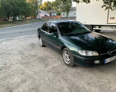 Зелений Опель Омега, об'ємом двигуна 2 л та пробігом 300 тис. км за 1600 $, фото 1 на Automoto.ua