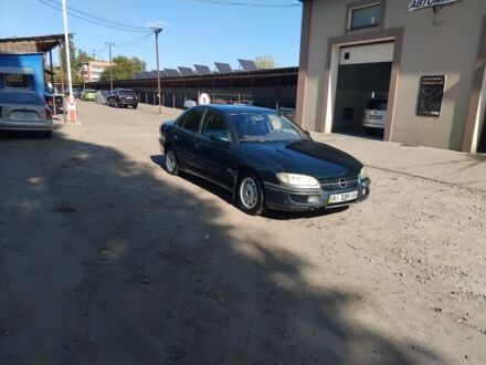 Зеленый Опель Омега, объемом двигателя 2 л и пробегом 400 тыс. км за 900 $, фото 1 на Automoto.ua