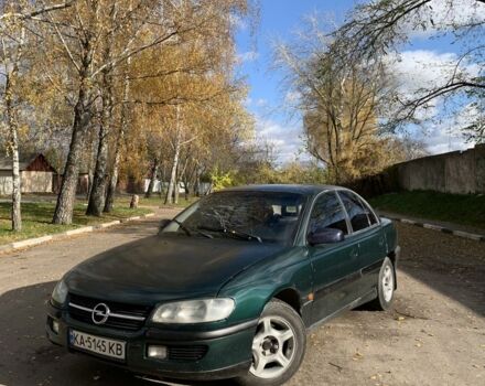 Зеленый Опель Омега, объемом двигателя 2 л и пробегом 250 тыс. км за 1300 $, фото 1 на Automoto.ua