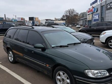 Зелений Опель Омега, об'ємом двигуна 2.5 л та пробігом 200 тис. км за 1200 $, фото 1 на Automoto.ua