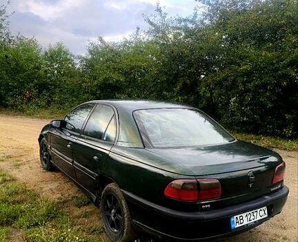 Зелений Опель Омега, об'ємом двигуна 2 л та пробігом 300 тис. км за 1000 $, фото 1 на Automoto.ua