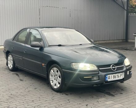 Зеленый Опель Омега, объемом двигателя 2 л и пробегом 300 тыс. км за 1704 $, фото 1 на Automoto.ua