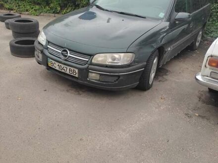 Зеленый Опель Омега, объемом двигателя 2.5 л и пробегом 250 тыс. км за 1200 $, фото 1 на Automoto.ua