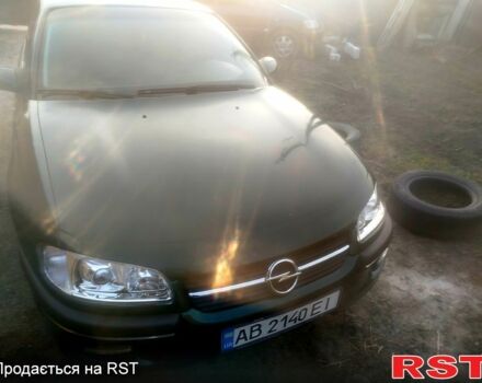 Зеленый Опель Омега, объемом двигателя 2 л и пробегом 300 тыс. км за 2600 $, фото 1 на Automoto.ua