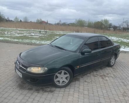 Зелений Опель Омега, об'ємом двигуна 2.5 л та пробігом 777 тис. км за 2000 $, фото 1 на Automoto.ua