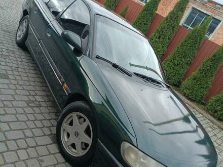 Зеленый Опель Омега, объемом двигателя 2.5 л и пробегом 400 тыс. км за 2150 $, фото 1 на Automoto.ua