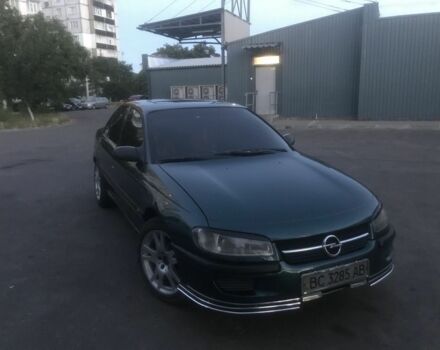Зеленый Опель Омега, объемом двигателя 2 л и пробегом 320 тыс. км за 1550 $, фото 1 на Automoto.ua