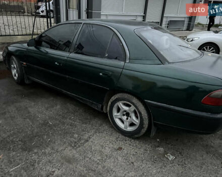 Зеленый Опель Омега, объемом двигателя 2 л и пробегом 350 тыс. км за 1500 $, фото 1 на Automoto.ua