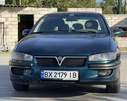 Зеленый Опель Омега, объемом двигателя 2 л и пробегом 350 тыс. км за 2100 $, фото 1 на Automoto.ua