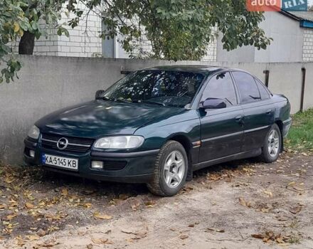 Зелений Опель Омега, об'ємом двигуна 2 л та пробігом 350 тис. км за 1950 $, фото 1 на Automoto.ua