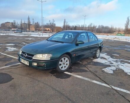 Зеленый Опель Омега, объемом двигателя 2 л и пробегом 400 тыс. км за 2500 $, фото 1 на Automoto.ua