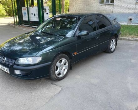 Зеленый Опель Омега, объемом двигателя 2 л и пробегом 230 тыс. км за 1550 $, фото 1 на Automoto.ua