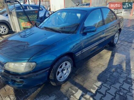 Зеленый Опель Омега, объемом двигателя 2 л и пробегом 245 тыс. км за 2000 $, фото 1 на Automoto.ua