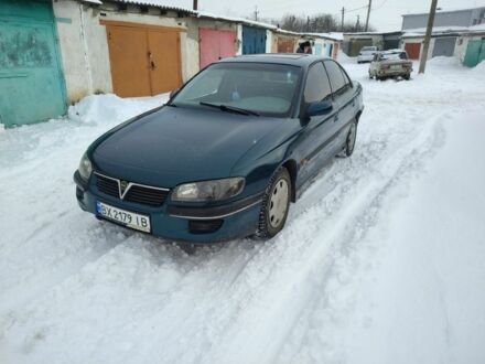 Зелений Опель Омега, об'ємом двигуна 2 л та пробігом 300 тис. км за 1500 $, фото 1 на Automoto.ua