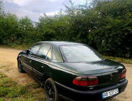 Зеленый Опель Омега, объемом двигателя 2 л и пробегом 300 тыс. км за 1000 $, фото 1 на Automoto.ua