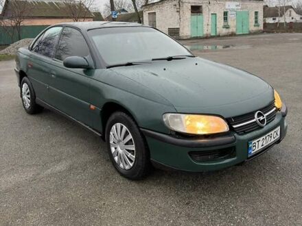 Зеленый Опель Омега, объемом двигателя 2 л и пробегом 230 тыс. км за 1400 $, фото 1 на Automoto.ua