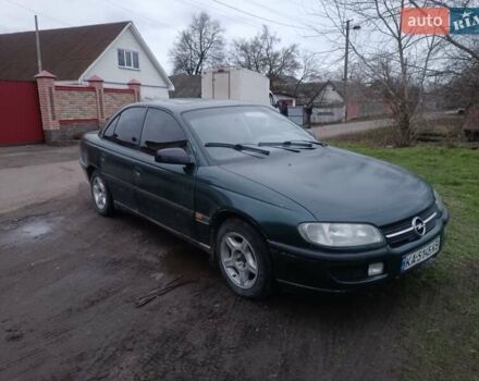Зеленый Опель Омега, объемом двигателя 2 л и пробегом 400 тыс. км за 850 $, фото 1 на Automoto.ua