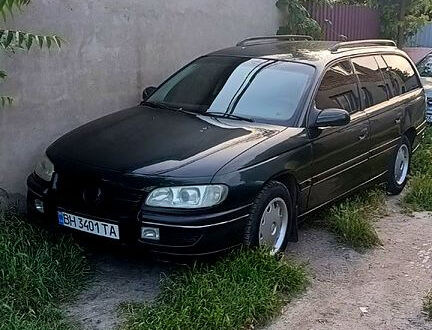 Зеленый Опель Омега, объемом двигателя 2 л и пробегом 500 тыс. км за 3000 $, фото 1 на Automoto.ua