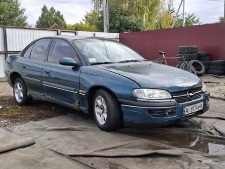 Зеленый Опель Омега, объемом двигателя 2 л и пробегом 180 тыс. км за 650 $, фото 1 на Automoto.ua