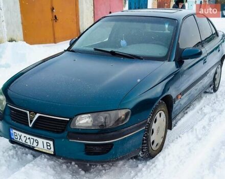 Зеленый Опель Омега, объемом двигателя 2 л и пробегом 400 тыс. км за 1600 $, фото 1 на Automoto.ua
