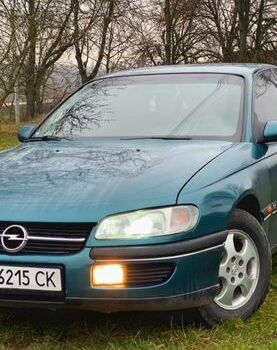 Зеленый Опель Омега, объемом двигателя 2 л и пробегом 377 тыс. км за 2500 $, фото 1 на Automoto.ua