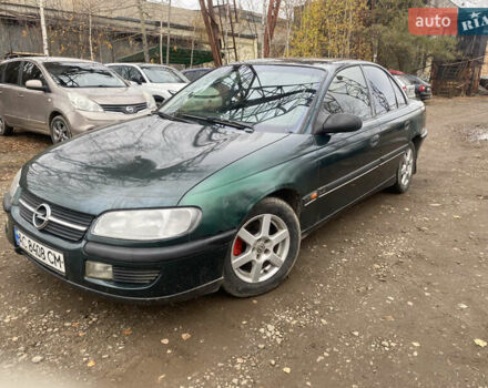Зеленый Опель Омега, объемом двигателя 2 л и пробегом 300 тыс. км за 1300 $, фото 1 на Automoto.ua
