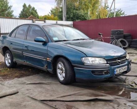 Зелений Опель Омега, об'ємом двигуна 2 л та пробігом 180 тис. км за 650 $, фото 1 на Automoto.ua
