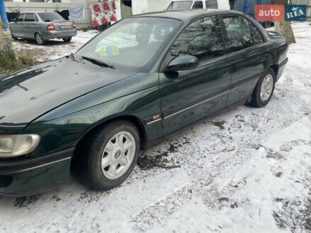 Зеленый Опель Омега, объемом двигателя 1.8 л и пробегом 100 тыс. км за 1750 $, фото 1 на Automoto.ua