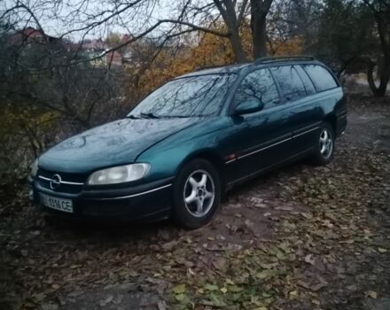 Зеленый Опель Омега, объемом двигателя 2.5 л и пробегом 204 тыс. км за 828 $, фото 1 на Automoto.ua