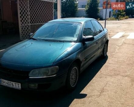 Зеленый Опель Омега, объемом двигателя 2 л и пробегом 400 тыс. км за 1600 $, фото 1 на Automoto.ua