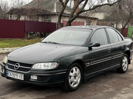 Зеленый Опель Омега, объемом двигателя 2.5 л и пробегом 180 тыс. км за 1499 $, фото 1 на Automoto.ua