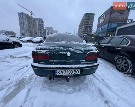 Зеленый Опель Омега, объемом двигателя 2 л и пробегом 400 тыс. км за 2500 $, фото 1 на Automoto.ua