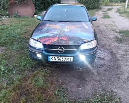 Зеленый Опель Омега, объемом двигателя 2 л и пробегом 350 тыс. км за 1500 $, фото 1 на Automoto.ua