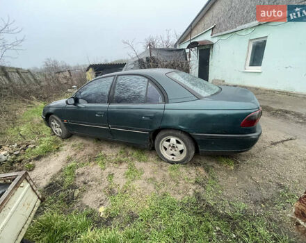 Зеленый Опель Омега, объемом двигателя 2 л и пробегом 313 тыс. км за 2362 $, фото 1 на Automoto.ua