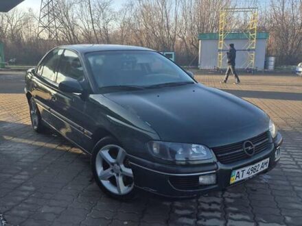 Зеленый Опель Омега, объемом двигателя 2.6 л и пробегом 270 тыс. км за 2500 $, фото 1 на Automoto.ua