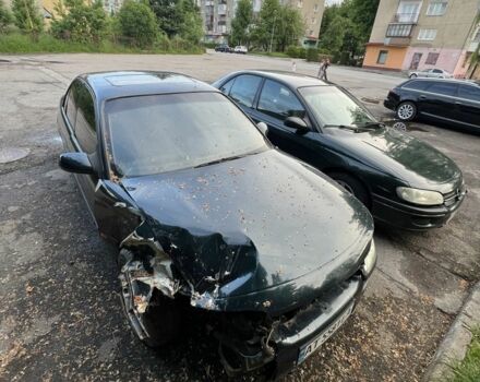 Зеленый Опель Омега, объемом двигателя 2 л и пробегом 400 тыс. км за 600 $, фото 1 на Automoto.ua