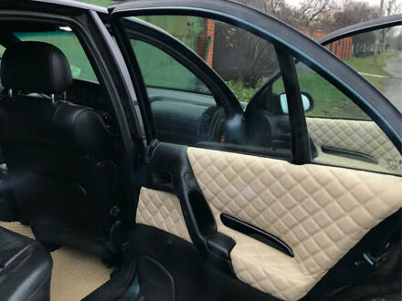 Зеленый Опель Омега, объемом двигателя 2 л и пробегом 200 тыс. км за 2200 $, фото 1 на Automoto.ua