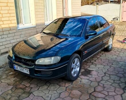 Зеленый Опель Омега, объемом двигателя 2 л и пробегом 500 тыс. км за 700 $, фото 1 на Automoto.ua