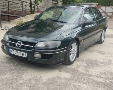 Зеленый Опель Омега, объемом двигателя 2 л и пробегом 280 тыс. км за 2500 $, фото 1 на Automoto.ua