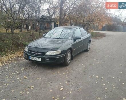 Зеленый Опель Омега, объемом двигателя 2 л и пробегом 380 тыс. км за 2800 $, фото 1 на Automoto.ua