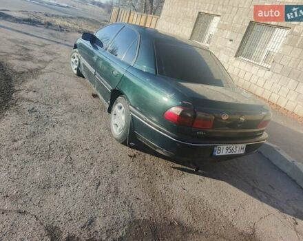 Зеленый Опель Омега, объемом двигателя 2 л и пробегом 555 тыс. км за 1650 $, фото 1 на Automoto.ua