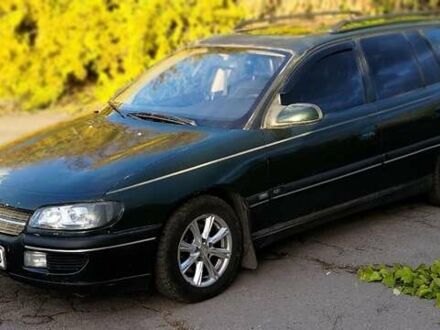 Зелений Опель Омега, об'ємом двигуна 2 л та пробігом 484 тис. км за 2000 $, фото 1 на Automoto.ua