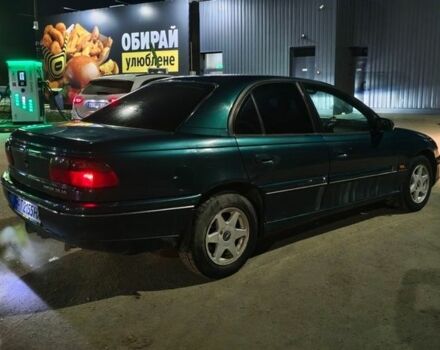 Зеленый Опель Омега, объемом двигателя 2.5 л и пробегом 390 тыс. км за 2300 $, фото 1 на Automoto.ua