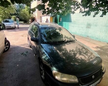 Зелений Опель Омега, об'ємом двигуна 2 л та пробігом 200 тис. км за 1400 $, фото 1 на Automoto.ua