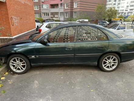 Зелений Опель Омега, об'ємом двигуна 2.5 л та пробігом 250 тис. км за 1157 $, фото 1 на Automoto.ua